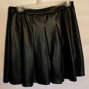 Black pleated vegan leather mini skirt